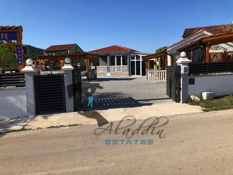 A beautiful one-story holiday house in picturesque village of Putičanje near Pirovac, a perfect combination of traditional Dalmatian heritage and contemporary architecture with an emphasis on providing everything necessary for family life and stay, f...
