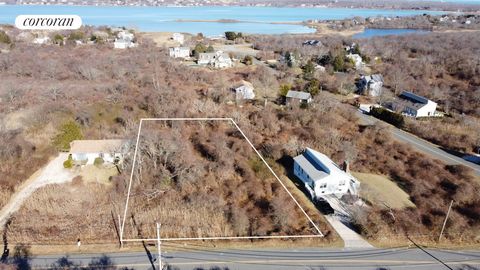 Montauk, New York. Vacant lot directly across from the Montauk Downs tennis courts and Olympic size pool. Backs up to over 10 acres of Town of East Hampton Preserved land.