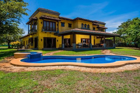 Welcome to Casa Miraflores, an exquisite colonial-style estate home located in the prestigious Reserva de Golf Community within Hacienda Pinilla. This luxurious property offers a captivating blend of elegance and comfort, with four bedrooms, five and...