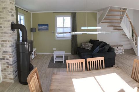 Our cozy 100m² holiday home - in a settlement on the western edge of Glowe - is located in the quieter part of the island of Rügen. It is equipped with a sun terrace with parasol, fireplace, new kitchen since March 2021, 2 bathrooms, etc. It is suita...