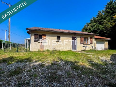 Maison de plain-pied avec garage et véranda