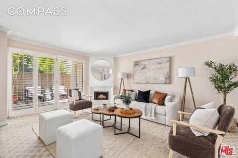 Tucked away in a tree-filled residential neighborhood where Wilcox Avenue spills into Hancock Park, this delightful townhome offers a feeling of seclusion and privacy away from the hustle and bustle of the city. Lush, manicured landscaping welcomes g...