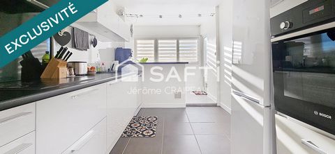 Centre ville : Appartement rénové avec 3 chambres + garage + cave + parking.