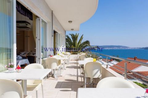 Lovely family hotel for sale, located in beautiful location, only 5 km from Trogir. This hotel is positioned in a quiet area, 80 m from the sea and offers gorgeous sea view. It consists of 6 apartments and 12 double bedrooms (2+2 and 2+1). Each accom...