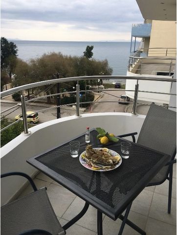 Seafront apartment for sale in Agioi Theodoroi, Corinthia. The apartment is 70 sq.m., located on the second floor. It consists of a living room and kitchen, two bedrooms and a bathroom. Year of construction – 2008. The apartment has its own parking. ...
