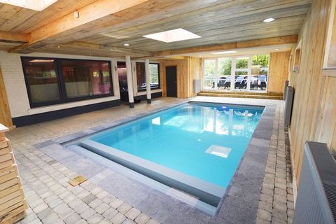 This luxurious 11-bedroom holiday home is near the town centre in Malmedy and can accommodate 22 people. It has spacious bedrooms, a private swimming pool for enjoying a splash, and wellness equipment like a sauna for people of all ages, offering a p...