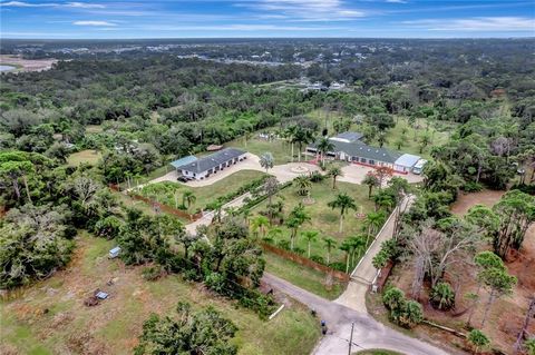 One or more photo(s) has been virtually staged. Welcome to your private oasis at the end of a tranquil gravel road! This exceptional real estate property spans almost 5 acres of lush landscape, offering unparalleled privacy and serenity. As you appro...