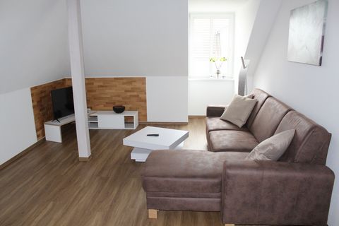 The furnished and renovated two room attic apartment (48 sqm living area, base area roughly 60sqm) with parking is in an apartment house which is located in Cottbus-Ströbitz (close to the university). The distance to Altmarkt and the train station is...