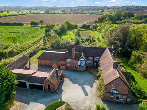 Nestled amidst the picturesque landscape of Warwickshire in Gibbet Hill, is where Cryfield Grange Farmhouse stands as a timeless testament to history and grandeur. This magnificent Grade II listed property, dating back to the year 1280, beckons to th...