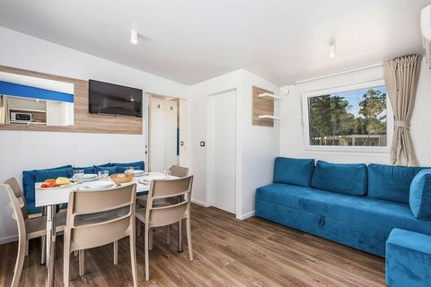 Spacious holiday complex directly on the gently sloping, beautiful pebble beach with modern and high-quality mobile homes. Depending on the location of the mobile home, it is only 20 to 200 meters to the beach, where two sun loungers are available pe...