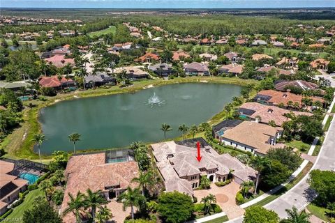2024 just completed NEW Flat Tile Roof! SPECTACULAR LAKEFRONT ESTATE /FIVE CAR GARAGE.The bones are fabulous 5,538 sq.ft. living space and a total of 7,753 sq.ft. Floor to ceiling glass doors disappear into the wall & open to tropical mini resort/poo...