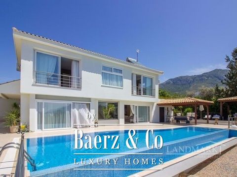 This exquisite luxury villa is located in the most sought-after area of Kyrenia, the Bellapais region, bordering Ozankoy and Catalkoy. The villa is elevated and has incredible panoramic views overlooking an unspoilt ravine, the coastline of Kyrenia a...