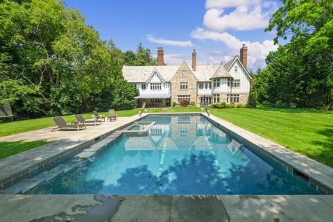 Exceptionally private Manor home with an inviting circular courtyard, oversized inground heated pool and landscaped grounds splays prominently on beautiful parklike 1.49 acres. Nested discreetly in Murray Hill, a brilliant addition (2015) exquisitely...