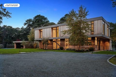 This stunning custom Modern home designed by Diego Petrate serves as the epitome of a Hamptons retreat. Amazing quality and detailing like no other, this thoughtfully designed residence positioned at the heart of an expansive lot offers a 360-degree ...