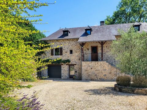 Situated in a privileged position overlooking the gently rolling valleys of the Aveyron, this renovated stone country house has everything you need for a permanant or secondary residence. It is superbly presented, totally private, yet only 4km from t...