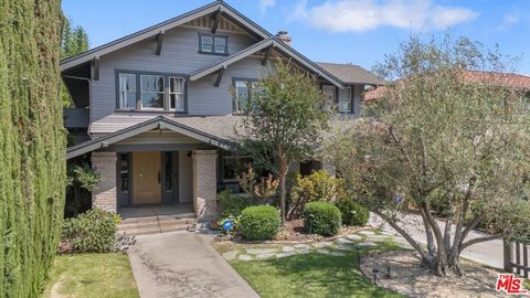 This stunning Craftsman blends original character with thoughtful modern updates. Step into the spacious living room, filled with rich wood trim and timeless charm. The formal dining room features wood-beamed ceilings and classic wainscoting, opening...