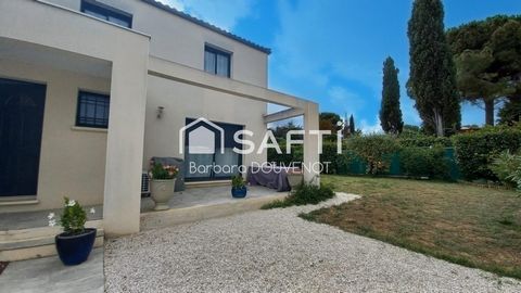 Maison de 100 m² sur 362 m² de terrain arboré - 3 chambres, 2 salles d'eau, garage, jardin.