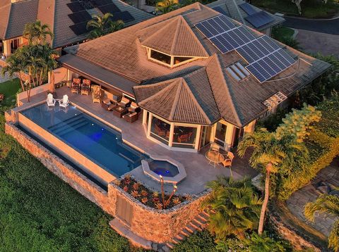 Upon entering this magnificent 3,315 sq. ft. home you will be mesmerized by its spectacular panoramic due west views of the Pacific Ocean between Lana'i and Moloka'i offering colorful year-round sunsets. A remodeled masterpiece featuring vaulted ceda...