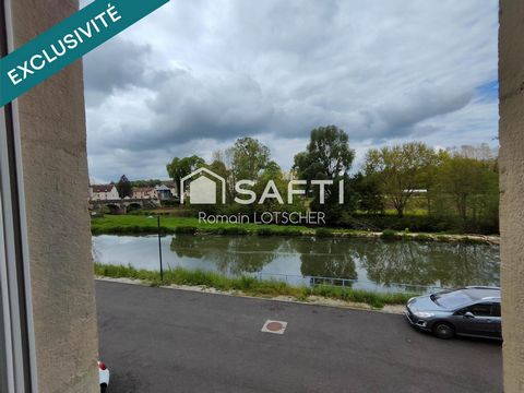 Appartement de 1948 composé de 3 chambres, salon, salle à manger, cuisine et d'un grand garage. Magnifique vue sur la Saône.
