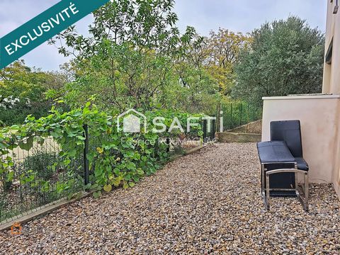 Au centre du village dans résidence sécurisée appartement de 70 m² avec deux places de parking