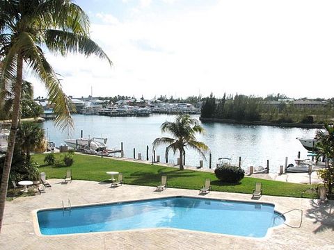 This beautiful one bedroom unit is situated in the gated residence of Harbour House Towers. With a beautiful pool and second to none views of Port Lucaya Marina, this is a perfect condo for anyone who loves the water. Updated with Coral Windows which...