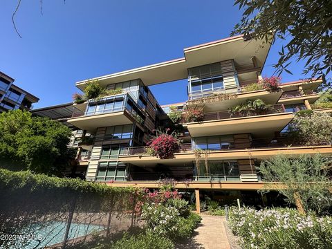In the heart of Old Town Scottsdale , be a part of the Optima Camelview experience with this lovely modern 2 bedroom unit. Enjoy the views of the lush greenspace and water features through your floor to ceiling windows. The owner suite offers a priva...