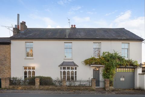 Nestled on the esteemed Green Street, a desired address in Lower Sunbury, this residence welcomes you into a realm of sophistication and tranquillity. Just a short walk from the River Thames, its idyllic location promises a lifestyle of leisure and c...