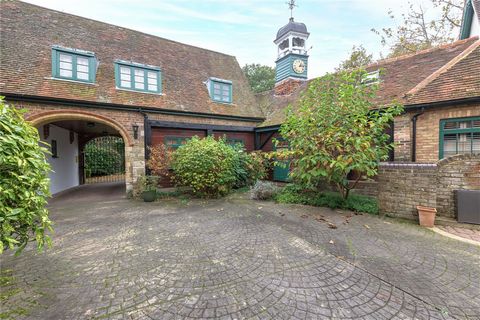 This is a rare opportunity to acquire a home oozing with character and charm on the prestigious Coombe estate. The Stables were built in 1863 and are Grade II listed, designed by the renowned architect William Devey. They were used as riding stables ...