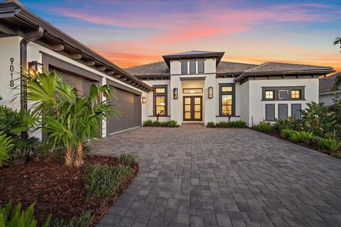 Experience the pinnacle of luxury coastal living in this meticulously designed home within Sarasota’s exclusive Skye Ranch community, where timeless elegance meets modern sophistication and tranquility abounds. Nestled against serene preserve views, ...