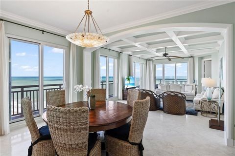 One-of-a-kind oceanfront penthouse w/breathtaking panoramic views of the Atlantic Ocean creating an idyllic backdrop! Brilliant open concept layout effortlessly blends modern design w/high-end finishes. Custom lit quartzite countertops, top-of-the-li...