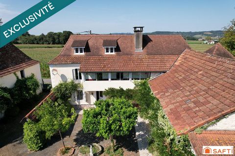 Authentique Béarnaise 213M2 avec dépendances et jardin à l’anglaise