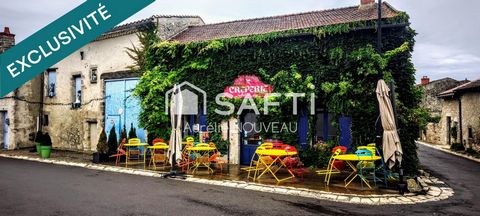 Murs et fonds de commerce dans le village de Charroux