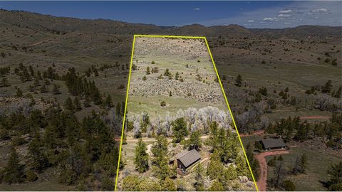 This property packs quite a punch. There are 35 deeded acres with a 2-bedroom 1-bathroom cabin, yet the amenities are of a large ranch with private access to many recreational activities. This low maintenance property is a perfect set up for anyone w...
