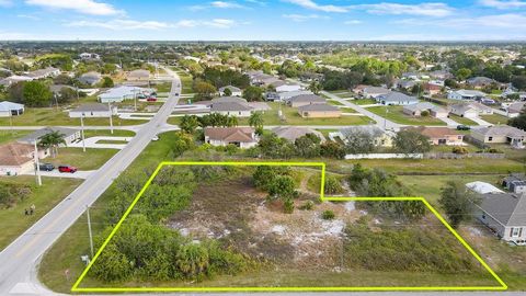 3 Commercial Lots wrapping around the corner of Port St. Lucie Blvd & Hamberland Ave. 207 feet on Hamberland & 154 feet on Port St. Lucie Blvd. A significant drainage canal in the rear of the property provides additional privacy in the back of the pr...