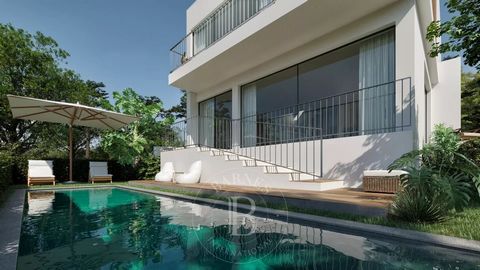 Villa contemporaine de 3 chambres avec vue sur la mer. Située dans le quartier de Murches à Cascais, elle dispose d'un jardin avec piscine et d'un garage. Livrée clé en main avec de bons matériaux et finitions.