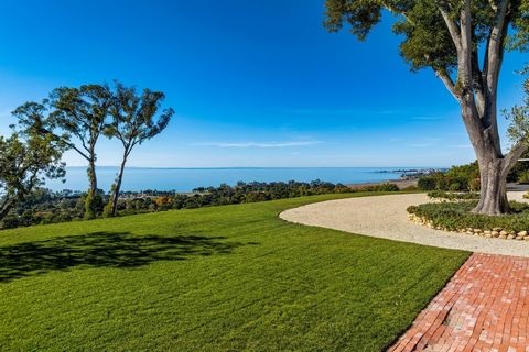 Truly exceptional one-of-a-kind property! Panoramic ocean, island, coastline & mountain views from expansive, level homesite. Two parcels in prime Hope Ranch location on private and usable 5.5 acres. Single-level home opening North and South to breat...