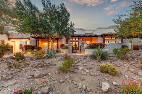 Welcome to this impeccably maintained southwest inspired custom home, located inside the guard gated community at Superstition Mountain Golf & Country Club along the edge of the legendary Superstition Mountains. Nestled on its own expansive 1+ acre l...
