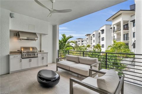 Welcome to Eleven Eleven Central where exquisite design and unrivaled amenities meet one of the most prime locations in all of Naples. Immerse yourself in elegance as you explore the interior of this new construction condo. Upgraded wood flooring gra...