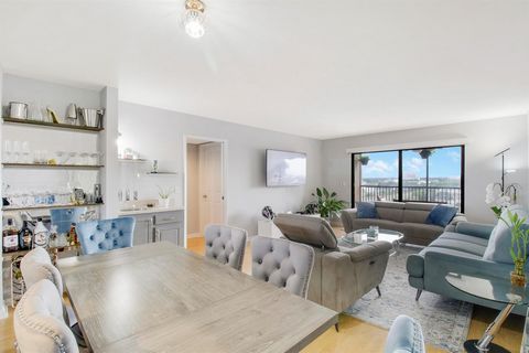Step into luxury living with this beautifully remodeled condominium nestled in the sought-after Cypress Bend Community. Perched on the 8th floor, this expansive 2-bedroom, 2-bathroom residence spans 1222 square feet, offering breathtaking vistas of t...