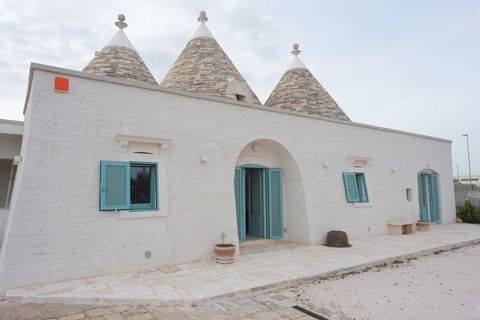 Pretty holiday accommodation, which consists of two neighboring but independent residential units and is therefore ideal for a holiday with 2 families or couples of friends. Your holiday accommodation impresses with its classic style with trulli roof...