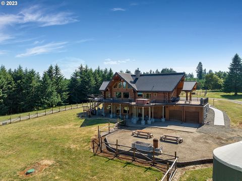 GORGEOUS views from the top of the Willamette Valley in this secluded custom Pioneer Log Home on over 42 acres! Enjoy privacy and seclusion all while being located just 21 miles from Eugene Airport, 21 miles from the heart of Corvallis and Oregon Sta...