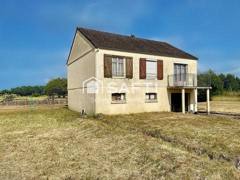 Maison sur sous sol avec vaste terrain et hangar