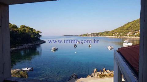 Villa for sale under construction with a total area of ​​398 m2, located in an attractive location in the first row to the sea on the south side of the island of Korcula. The villa is located on a plot of 938 m2, has three floors and offers a beautif...