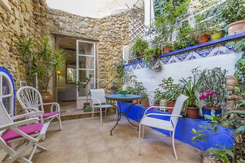 Quaint town house with lovely patio and excellent rental potential in Pollensa This picturesque village house is offered for sale close to the famous Calvari Steps in Pollensa, walking distance from the Plaza Major where the popular market takes plac...