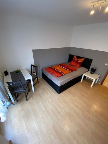 The 1-room apartment is located directly in the city centre of Worms and has a living space of 25m2, is fully furnished and equipped. It has a big terrace, a private bathroom with shower (towels are also available), wardrobe, double-bed (140x200), de...