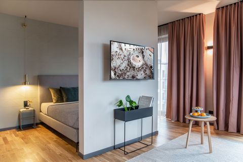 Space for free development: The areas of living, working, cooking and eating are harmoniously integrated in the apartment Medium. In our Medium Apartment you can develop freely and enjoy the highest comfort. Both in your separate sleeping area with a...
