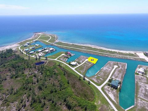 Welcome to a piece of tropical paradise nestled in the prestigious gated community of Old Bahama Bay, West End, Grand Bahama Island. Embrace the epitome of luxury living with this remarkable single-family canal vacant lot, offering an expansive canva...