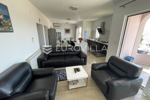 On one of the sunniest and most beautiful islands in the Adriatic, the island of Rab, an apartment is for sale on the 2nd floor of an apartment villa, size 105 m2. This beautifully and modernly furnished apartment consists of an entrance hall, two be...