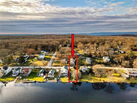WELCOME TO THE LAKE! 15 Snider Avenue offers the most idyllic cottage setting with an open floor plan and stunning year round lake views. Offering full water access, this sale includes a water front lot across that road that can house kayaks, boats a...