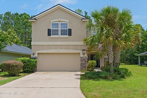 This Spacious home with NO CDD fees also has PAID OFF Solar panels! This large 4 bedroom & 3 and a half bathroom, home has Room for the whole family! Convenient commute to NAS. Located in the community of Forest Hammock in desirable Oakleaf Plantatio...